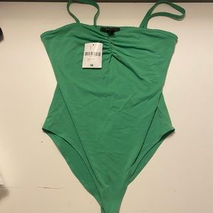 Woman’s Medium Green Spagetti Strap Bodysuit